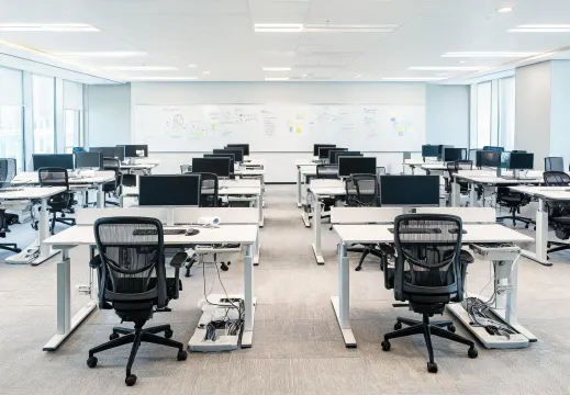 Corporate workspace with sit-stand desks
